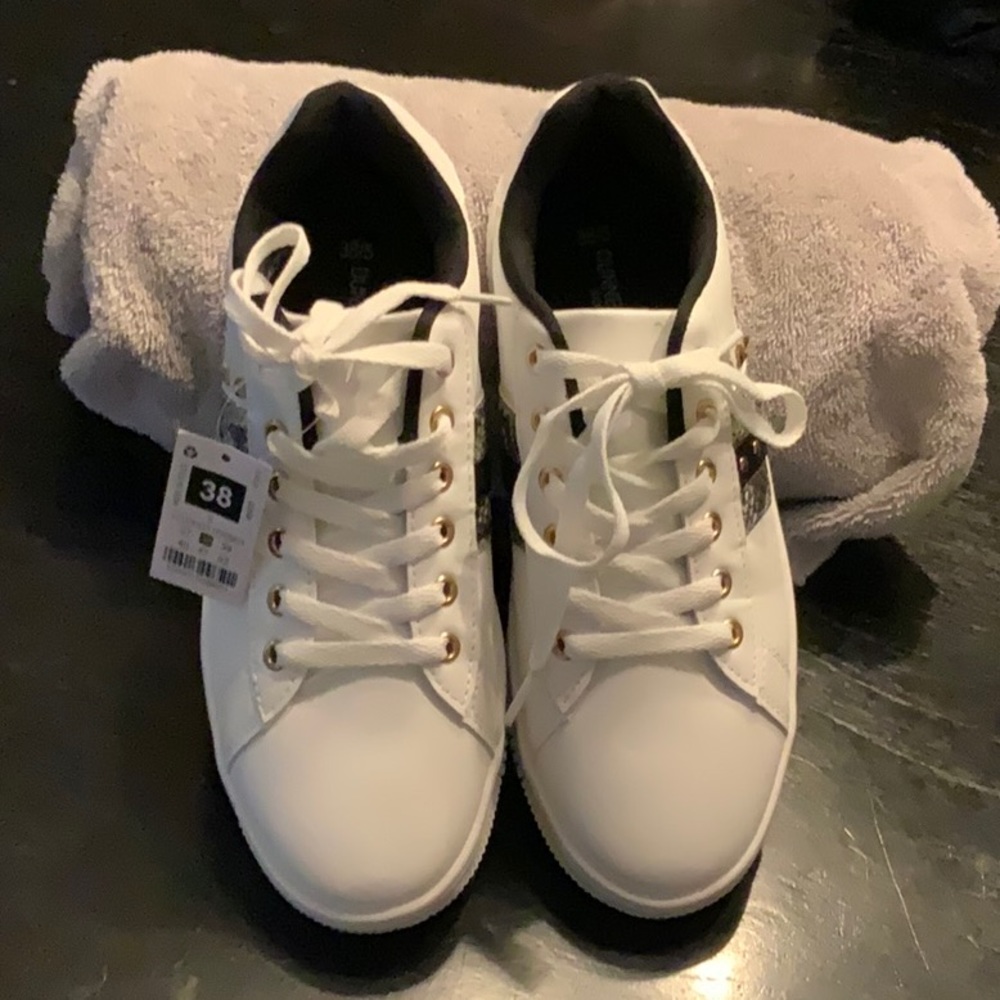 Brand new white dress sneakers with decorative detail. Michael Kors like